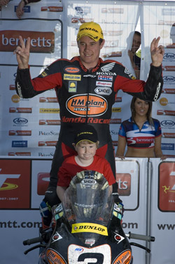John McGuinness celebrates his emotional victory